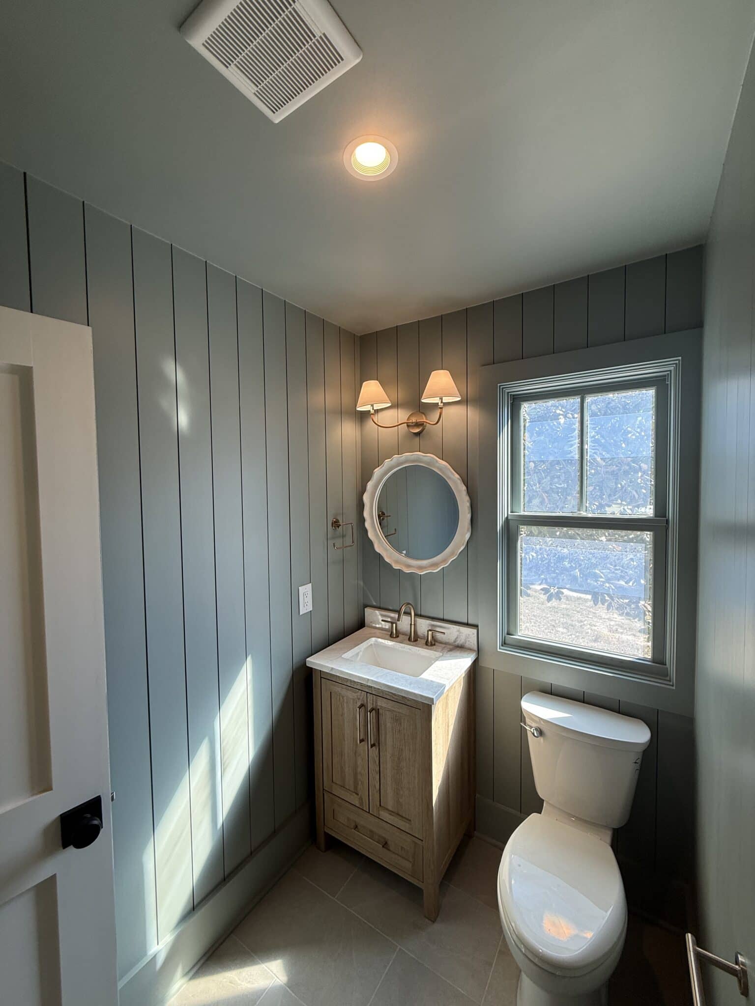 bathroom with new light fixtures
